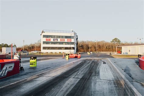 Track Elevation: 12 feet above sea level Acreage: 200 Length: 4,000 feet Width: 60 feet Barrier Walls: Concrete Racing Surface: 1/8th mile limestone aggregate concrete launch pad. . Dragstrip near me